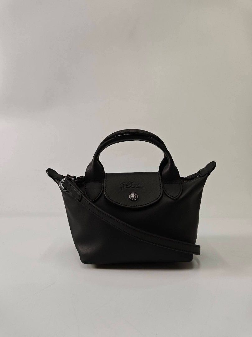 Longchamp Le Pliage Xtra Top Handle Bag XS black (Category: Cross-body Bags) located in Quezon City. Submitted by rnjcollections_eleganteph (Listing ID 1470601827, Image 2). Description: with dustbag, paperbag, care ard, tag and warranty.