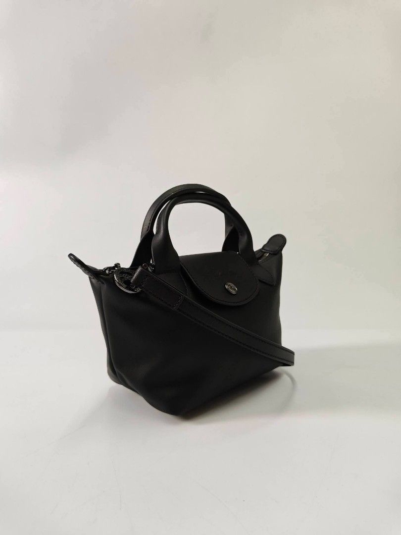 Longchamp Le Pliage Xtra Top Handle Bag XS black (Category: Cross-body Bags) located in Quezon City. Submitted by rnjcollections_eleganteph (Listing ID 1470601827, Image 3). Description: with dustbag, paperbag, care ard, tag and warranty.