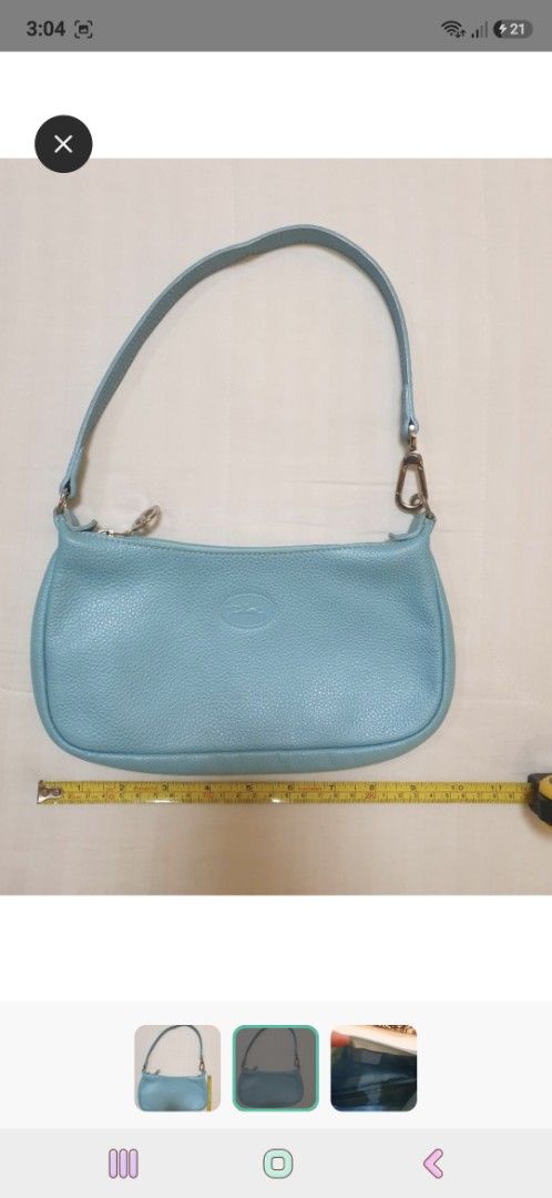 Longchamp light blue leather shoulder bag (Category: Luxury Bags & Wallets) located in Antipolo. Submitted by cheche2111 (Listing ID 1470616010, Image 2). Description: - Authentic Longchamp shoulder bag in a gorgeous light blue pastel shade - Crafted from durable and stylish pebbled leather - Compact size ideal for carrying daily essentials - Secure top zip closure with signature Longchamp interior lining - Features chic silver hardware details o