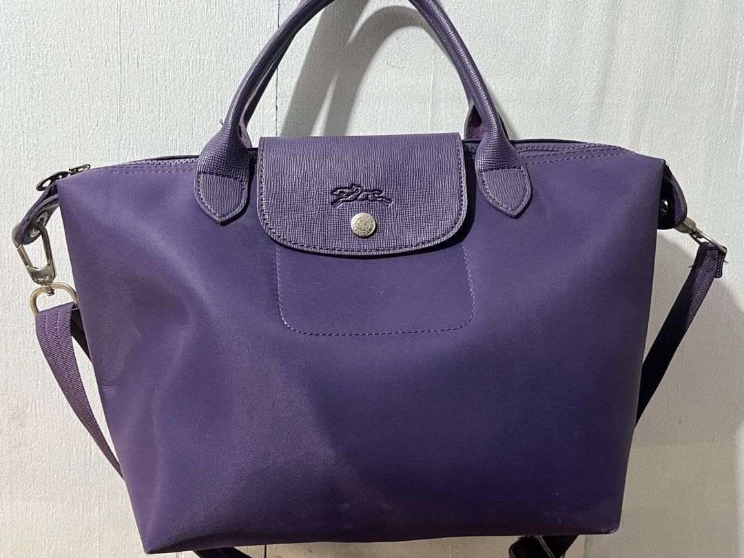 Longchamp Purple Neo Top Handle Bag with Strap (Category: Luxury Bags & Wallets) located in Manila. Submitted by ilovethings17 (Listing ID 1470645037, Image 1). Description: Medium Longchamp Le Pliage Neo PURPLE (not verified if legit!) rfs: decluttering!.