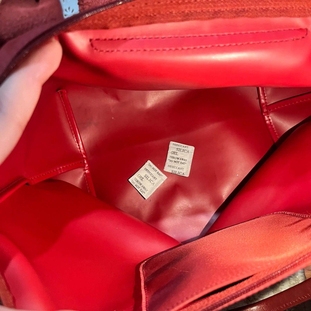 Longchamp Red Nylon Tote Bag (Category: Tote Bags) located in Binan City. Submitted by jdshoppee (Listing ID 1470666790, Image 2). Description: RFS: DECLUTTERING 💯 Authentic - Slight nego sa mabilis kausap - Authentic red Longchamp tote bag - Classic foldable design with top handle, snap flap, and zippered top closure - Deep red leather trim and sturdy handles - Clean red fabric interior with small slip pockets - Condition: Light scuff marks nea