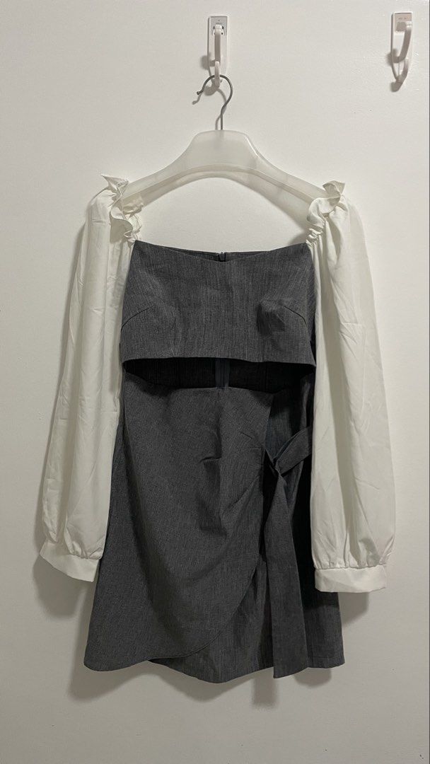 Long-sleeves Dress (Category: Dresses) located in Indang. Submitted by itsginnpom (Listing ID 1470582347, Image 1). Description: Size: S-M Design: Mini dress with long bishop sleeves, square neckline, and ruffled shoulders Details: Trendy cutout below the bust, wrapped skirt design with side tie Fabric: Smooth with visible texture Closure: Convenient back zipper Condition: Excellent/Like new.