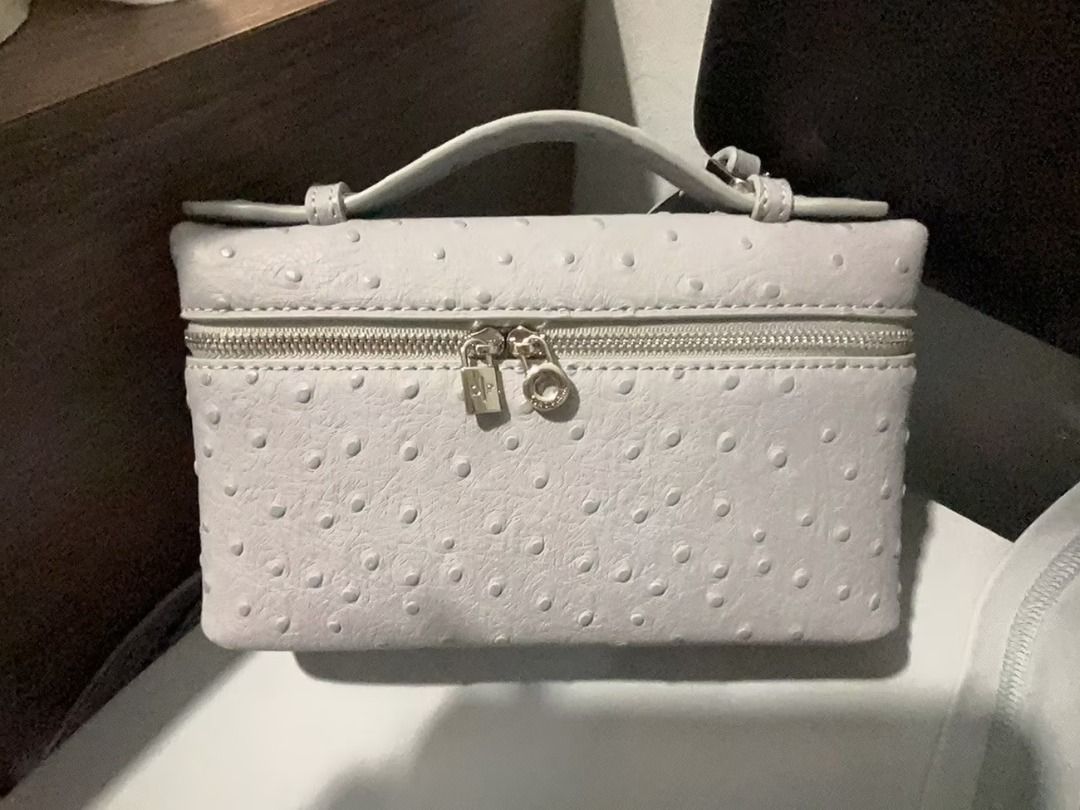 loro p extra pocket pouch bag ostrich leather (Category: Shoulder Bags) located in Quezon City. Submitted by japanandsingaporeluxepreloved (Listing ID 1470678920, Image 1). Description: .