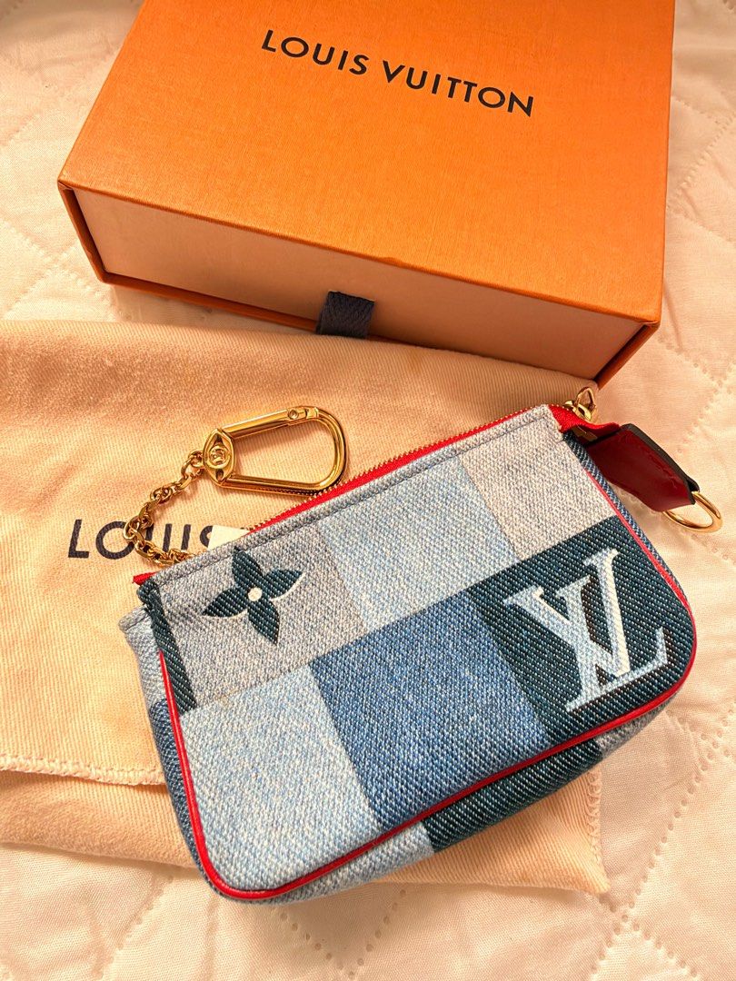 Louis Vuitton Blue Rouge Damier Monogram Denim Patchwork Micro Pochette wallet (Category: Luxury Bags & Wallets) located in Binan City. Submitted by alreadyloved.p (Listing ID 1470599386, Image 3). Description: Louis Vuitton Material: Denim and leather trim Includes: LV dust bag Origin: France Production Year: 2020 Date/Authenticity Code: SF0240 Measurements: 4.75” L x .8” W x 3.25” H Closure/Opening: Single zip closure Interior Lining: Fine text