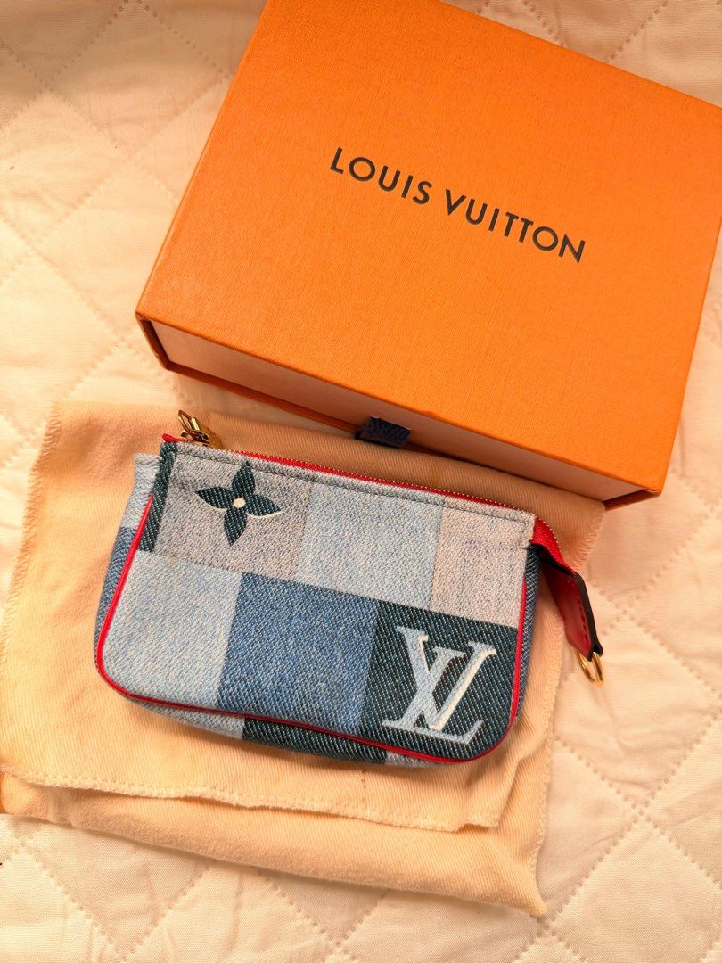 Louis Vuitton Blue Rouge Damier Monogram Denim Patchwork Micro Pochette wallet (Category: Luxury Bags & Wallets) located in Binan City. Submitted by alreadyloved.p (Listing ID 1470599386, Image 1). Description: Louis Vuitton Material: Denim and leather trim Includes: LV dust bag Origin: France Production Year: 2020 Date/Authenticity Code: SF0240 Measurements: 4.75” L x .8” W x 3.25” H Closure/Opening: Single zip closure Interior Lining: Fine text