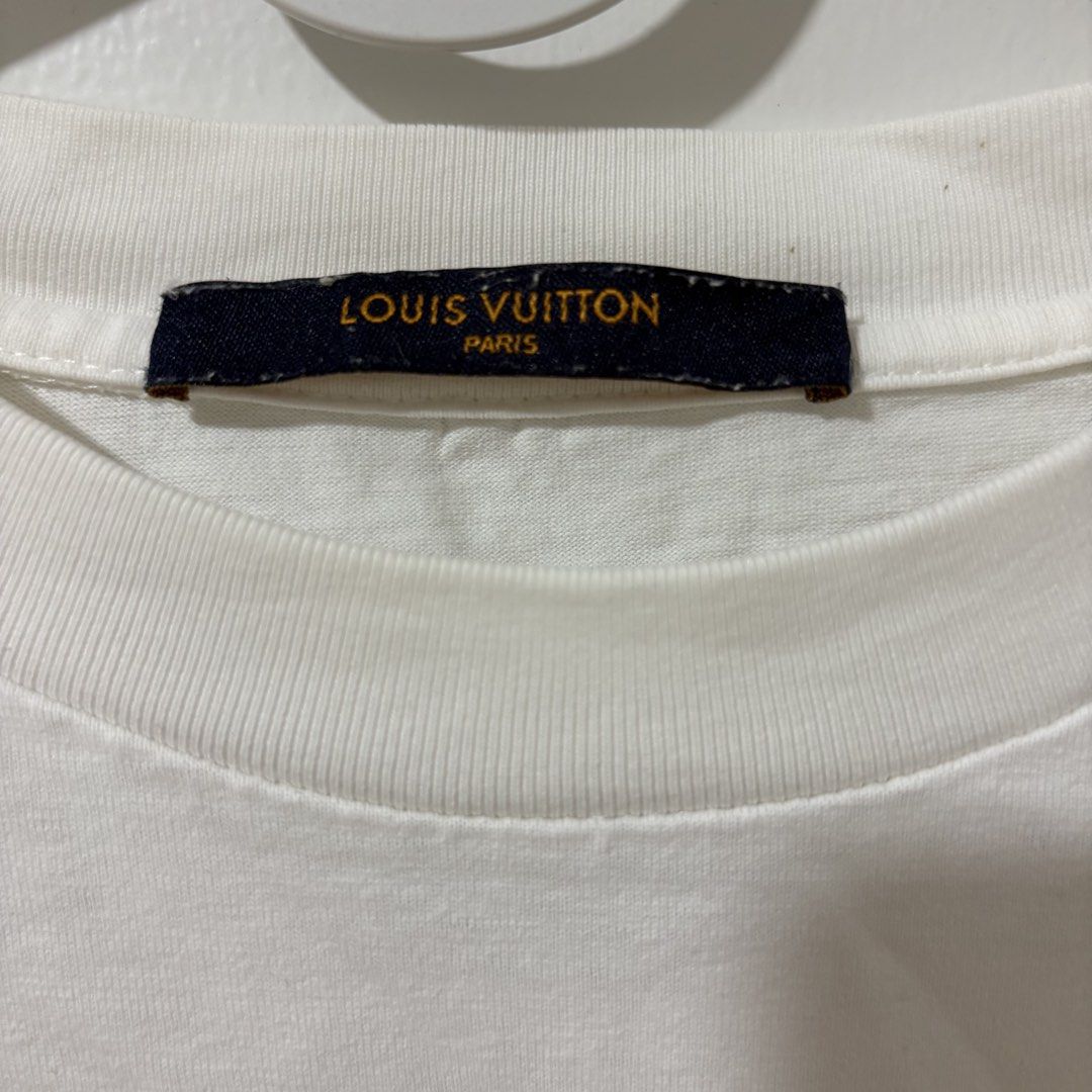 Louis Vuitton Embossed Logo White Oversized Shirt (Category: Tshirts & Polo Shirts ) located in Bulacan. Submitted by laleesa_ (Listing ID 1470702111, Image 2). Description: Issue: Pinhole Up to XL Men Made in Italy 22.5W x 28.5 L.
