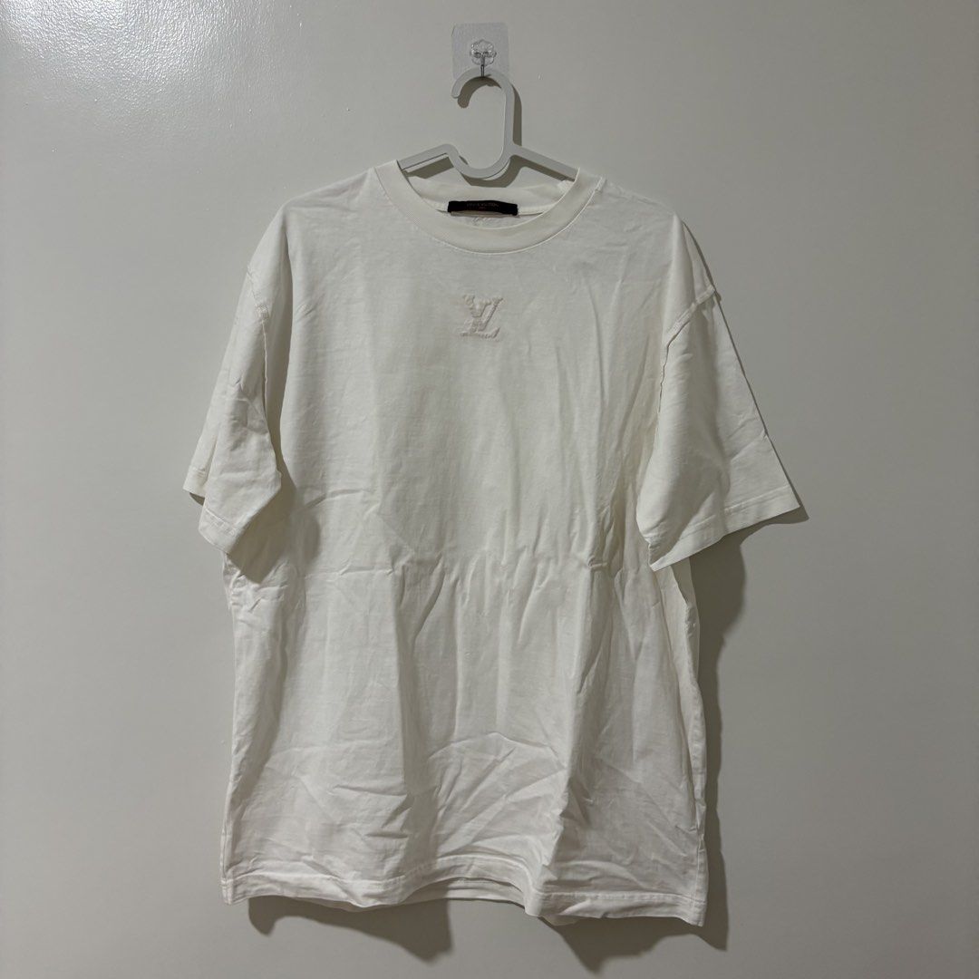 Louis Vuitton Embossed Logo White Oversized Shirt (Category: Tshirts & Polo Shirts ) located in Bulacan. Submitted by laleesa_ (Listing ID 1470702111, Image 1). Description: Issue: Pinhole Up to XL Men Made in Italy 22.5W x 28.5 L.