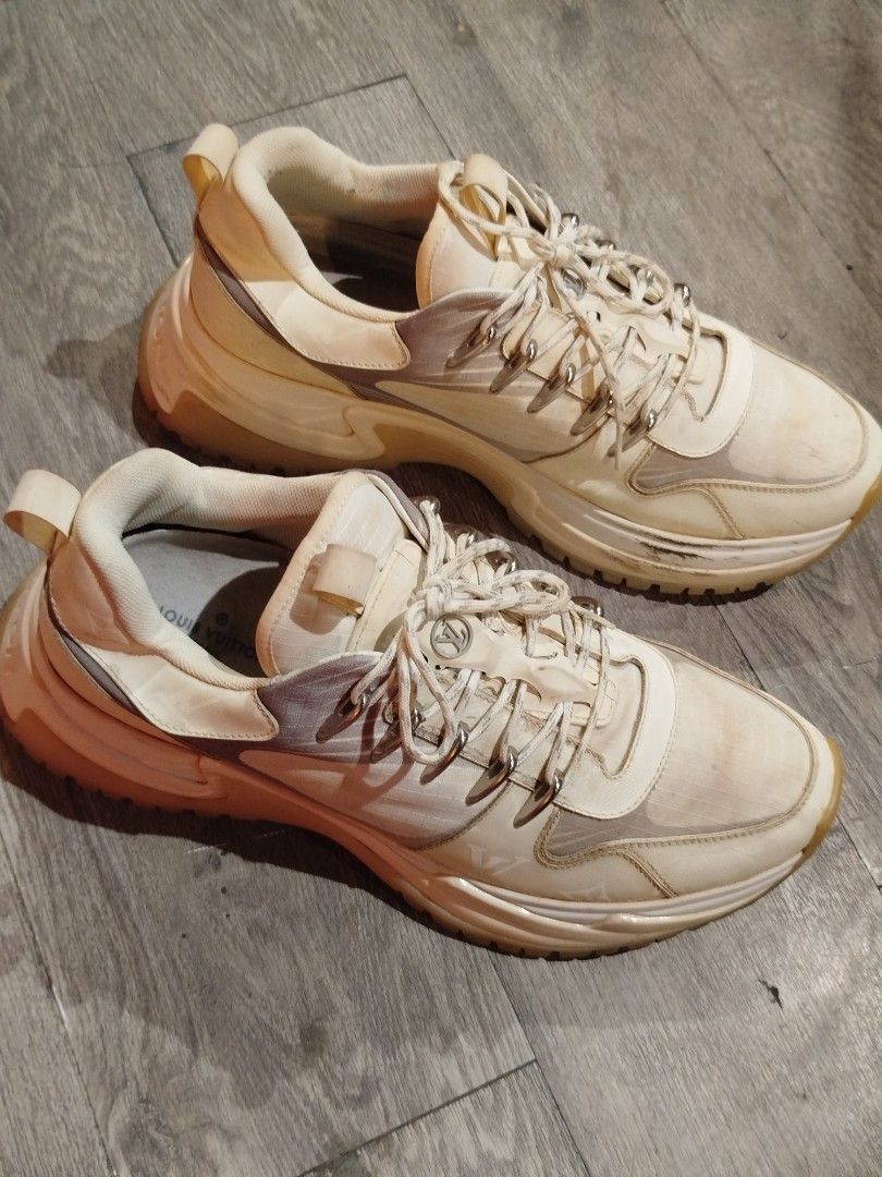 Louis Vuitton LV Sunset Trail Sneaker White (Category: Sneakers & Footwear) located in Quezon City. Submitted by epoquebyjaz (Listing ID 1470631438, Image 3). Description: - Authentic Louis Vuitton chunky sneakers in white and grey - Bold thick rubber soles with heavy lug tread pattern - Iconic LV logo on the tongue with silver-tone hardware - Convenient pull tabs at the heel and tongue - Stylish lace-up closure with original patterned laces - Co