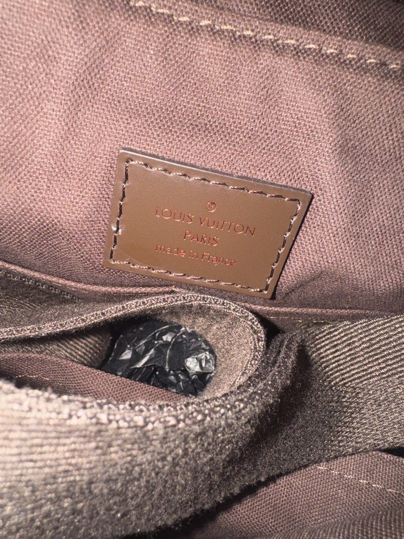 Louis Vuitton messenger bag (brown) (Category: Luxury Bags & Wallets) located in Taguig. Submitted by dependingonvibe (Listing ID 1470701850, Image 3). Description: Used only 3x for travel Minor scratch on metal hardware (last photo) Guaranteed authentic Comes complete with box and dustbag First owner.