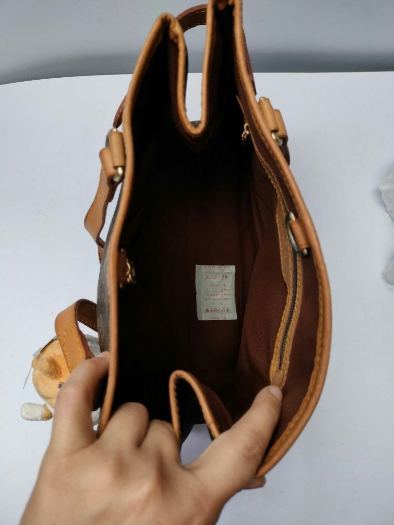 Louis Vuitton Monogram Cabas Mezzo Tote Bag (Category: Luxury Bags & Wallets) located in Baguio. Submitted by galdzz_23 (Listing ID 1470667939, Image 3). Description: - Authentic Louis Vuitton Cabas Mezzo tote in classic monogram canvas - Comfortable tan leather straps and trim with durable gold hardware - Spacious interior featuring a central zippered compartment, open sections, and an inner zip pocket - Adjustable side buckle details to customi