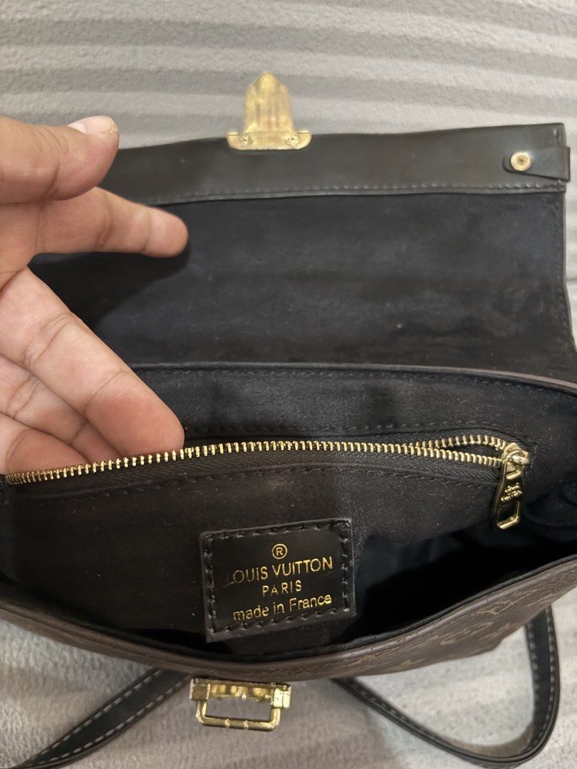 Louis Vuitton Monogram Canvas Shoulder Bag (Category: Luxury Bags & Wallets) located in Pasig City. Submitted by mau_llamas (Listing ID 1470691596, Image 2). Description: - Brand: Louis Vuitton - Design: Classic monogram canvas combined with a chic black leather flap top - Hardware: Elegant gold-tone push-lock closure and matching hardware - Strap: Adjustable black textured strap with stylish contrast stitching - Condition: Excellent pre-loved co