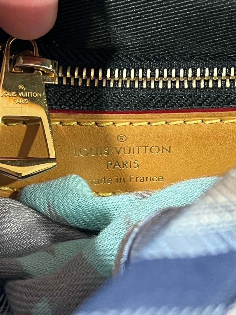 Louis Vuitton Monogram Canvas Shoulder Bag (Category: Luxury Bags & Wallets) located in Urdaneta. Submitted by jayceegarage (Listing ID 1470692050, Image 3). Description: - Brand: Louis Vuitton - Material: Classic Monogram canvas with Vachetta leather trim - Hardware: Gold-tone with front buckle closure - Strap: Single adjustable shoulder strap - Interior: Dark fabric lining with a secure zip pocket and heat stamp label (Louis Vuitton Paris Made 