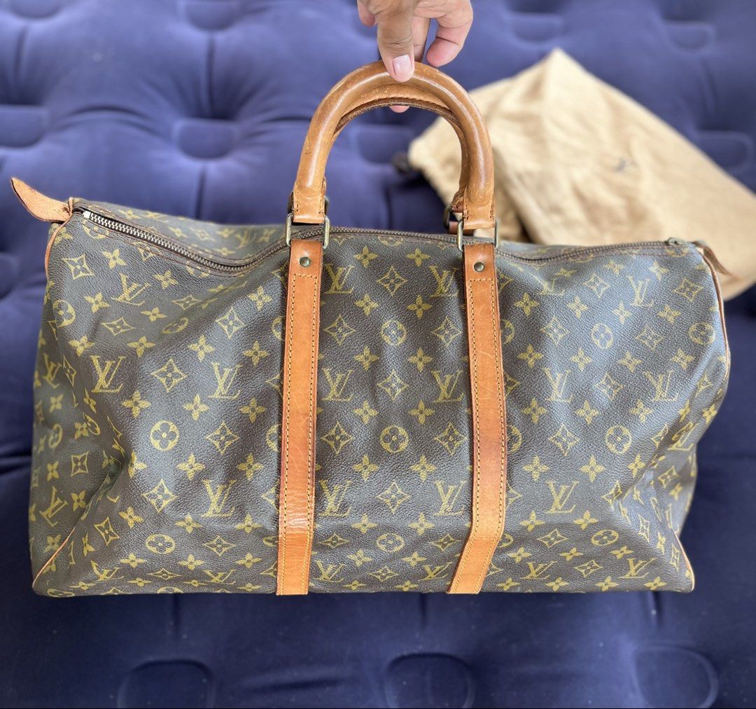 Louis Vuitton Monogram Keepall 50 Boston (Category: Luxury Bags & Wallets) located in Tacloban City. Submitted by luxbag_phhh (Listing ID 1470577988, Image 1). Description: Authentic Louis Vuitton Monogram Keepall 50 travel bag. Classic monogram canvas with vintage patina leather handles. Spacious interior for weekend trips. Includes original dust bag. No open pipe Clean interior/exterior No cracks on coated canvas With og dust bag Guaranteed aut