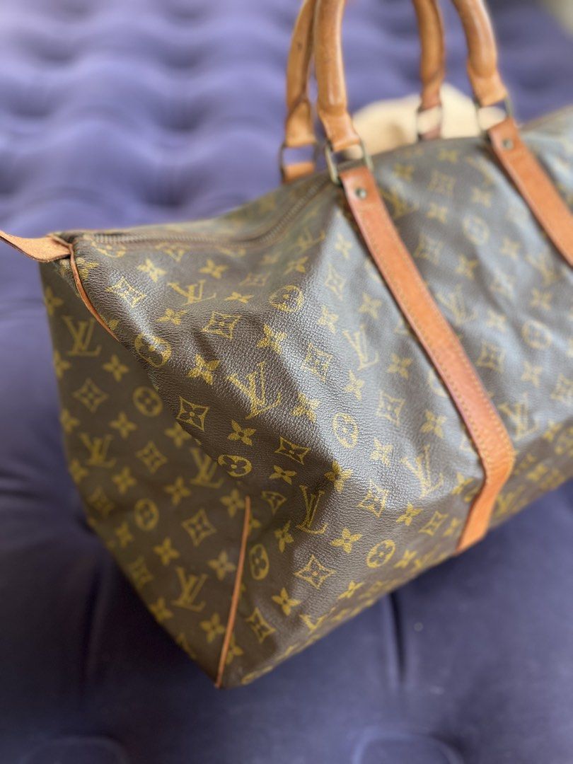 Louis Vuitton Monogram Keepall 50 Boston (Category: Luxury Bags & Wallets) located in Tacloban City. Submitted by luxbag_phhh (Listing ID 1470577988, Image 3). Description: Authentic Louis Vuitton Monogram Keepall 50 travel bag. Classic monogram canvas with vintage patina leather handles. Spacious interior for weekend trips. Includes original dust bag. No open pipe Clean interior/exterior No cracks on coated canvas With og dust bag Guaranteed aut