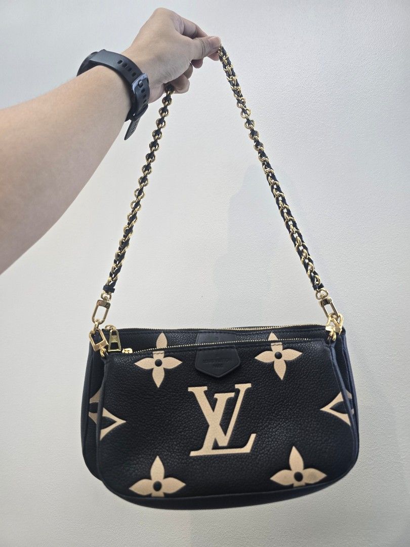 Louis Vuitton Multi Pochette Accessories Empreinte Leather Bag (Category: Luxury Bags & Wallets) located in Taguig. Submitted by mluxeph (Listing ID 1470605985, Image 1). Description: Louis Vuitton Multi Pochette Accessories Empreinte Leather Bag Material: Empreinte leather Stamp: Microchip Interior: One open pocket and one main compartment Measurements: 9.5"L X 1.75"W X 5.5"H (LARGE POUCH) 8"L X 1.5"W X 4.75"H (SMALL POUCH) Handle Drop: 12.25" H