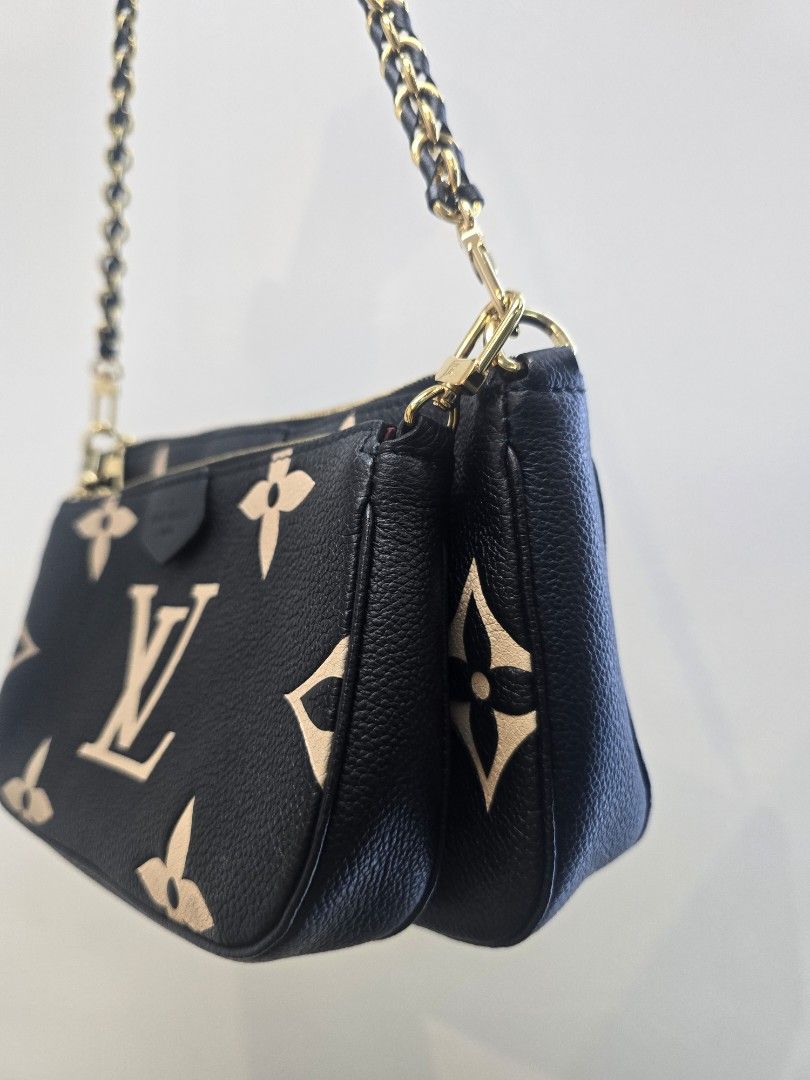 Louis Vuitton Multi Pochette Accessories Empreinte Leather Bag (Category: Luxury Bags & Wallets) located in Taguig. Submitted by mluxeph (Listing ID 1470605985, Image 3). Description: Louis Vuitton Multi Pochette Accessories Empreinte Leather Bag Material: Empreinte leather Stamp: Microchip Interior: One open pocket and one main compartment Measurements: 9.5"L X 1.75"W X 5.5"H (LARGE POUCH) 8"L X 1.5"W X 4.75"H (SMALL POUCH) Handle Drop: 12.25" H