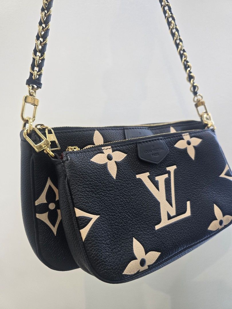 Louis Vuitton Multi Pochette Accessories Empreinte Leather Bag (Category: Luxury Bags & Wallets) located in Taguig. Submitted by mluxeph (Listing ID 1470605985, Image 2). Description: Louis Vuitton Multi Pochette Accessories Empreinte Leather Bag Material: Empreinte leather Stamp: Microchip Interior: One open pocket and one main compartment Measurements: 9.5"L X 1.75"W X 5.5"H (LARGE POUCH) 8"L X 1.5"W X 4.75"H (SMALL POUCH) Handle Drop: 12.25" H