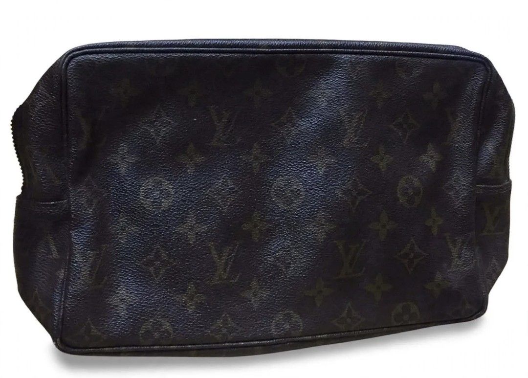 LOUIS VUITTONMonogram Trousse Toilette (Category: Luxury Bags & Wallets) located in Bulacan. Submitted by assorted.items (Listing ID 1470648003, Image 1). Description: This is an authentic LOUIS VUITTON Monogram Trousse Toilette 28. This classic case is crafted of signature Louis Vuitton monogram on the toile canvas. The interior lined with ivory leather and features a patch pocket and elastic holders. with issue.