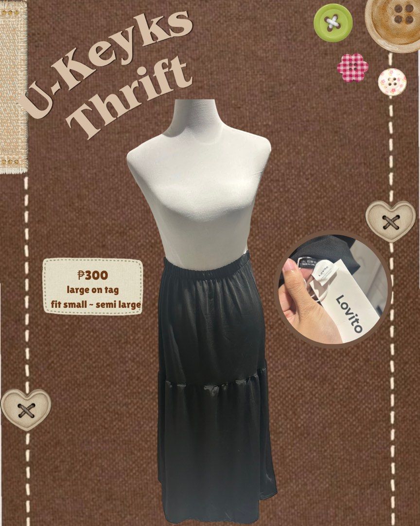 Lovito Black Tiered Midi Skirt (Category: Skirts) located in Cavite. Submitted by ukeyks (Listing ID 1470669576, Image 1). Description: - Brand: Lovito - Color: Black - Size: Tagged Large, best fits Small up to semi-Large - Waistband: Stretchable elastic for easy slip-on wear - Design: Flowy tiered midi style with a nice drape .