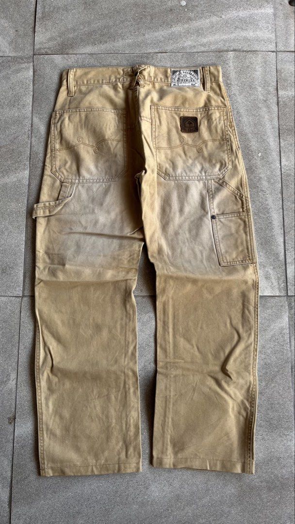 LRG Lifted Research Group Workwear Cargo Pants (Category: Jeans) located in Cabuyao City. Submitted by bulandos (Listing ID 1470656940, Image 1). Description: - Brand: LRG (Lifted Research Group) - Style: Workwear cargo pants / Relaxed carpenter fit - Color: Tan with natural fade - Material: Heavy-duty canvas - Features: Double knee panels, utility pockets, tool loop, and branded rear patch - Condition: Distressed details near the front pocket, g