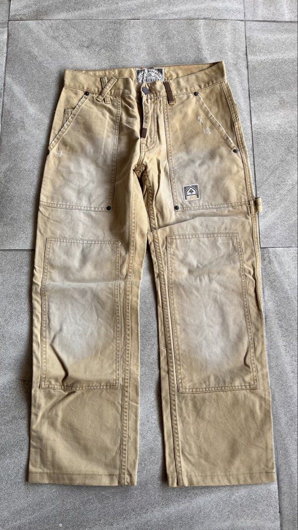 LRG Lifted Research Group Workwear Cargo Pants (Category: Jeans) located in Cabuyao City. Submitted by bulandos (Listing ID 1470656940, Image 2). Description: - Brand: LRG (Lifted Research Group) - Style: Workwear cargo pants / Relaxed carpenter fit - Color: Tan with natural fade - Material: Heavy-duty canvas - Features: Double knee panels, utility pockets, tool loop, and branded rear patch - Condition: Distressed details near the front pocket, g