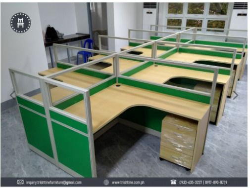 L-shape Workstation | 8 seater (Category: Office Furniture & Fixtures) located in Caloocan City. Submitted by jim.trishtineofficefurnitures (Listing ID 1470605010, Image 1). Description: - Modular office workstation with green and wood-finish partitions - Includes built-in desk space and a matching mobile pedestal drawer unit - Sturdy aluminium frames equipped with privacy dividers - Ideal for shared workspaces, teams, or call center setups - Mul