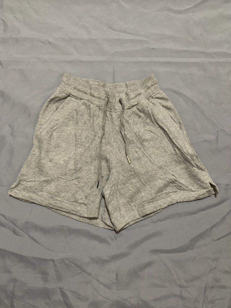 Lululemon Grey Sweat Shorts Size 4 (Category: Shorts) located in General Santos City (Dadiangas). Submitted by stockyards (Listing ID 1470590869, Image 2). Description: - Brand: Lululemon - Size: 4 (tag attached inside waistband) - Color: Classic Grey - Material: Comfortable cotton - Features: Drawstring waist with metallic tips, functional side pockets - Condition: Excellent, fabric and wash tags fully legible - Origin: Made in Philippines - Sty