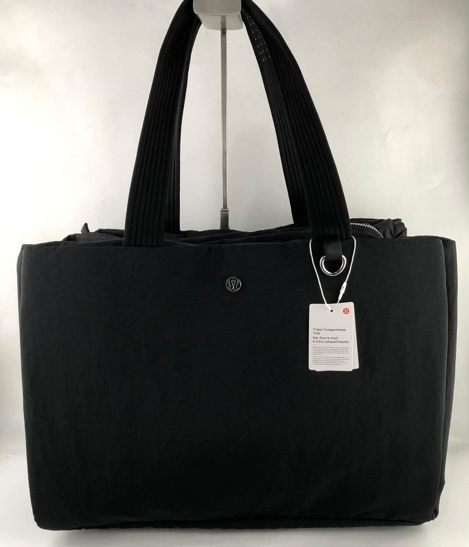 Lululemon Triple Compartment Tote Bag 18L (Category: Tote Bags) located in Manila. Submitted by msddirectfactoryoutlet (Listing ID 1470594945, Image 1). Description: Triple Compartment Tote Bag Dimensions: W 42cm x D 15cm x H 30cm (16.5" x 5.9" x 11.8") Volume: 18L.