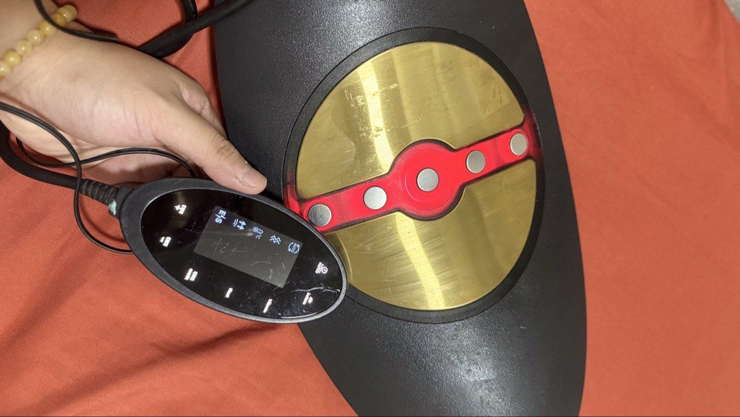 Lumear Traction Device with Controller and AC Adapter (Category: Massage Devices) located in Marikina City. Submitted by sdpii (Listing ID 1470692564, Image 2). Description: - Lumear traction device for back and body care - Includes main unit, remote control screen, and Teka AC adapter plug - Fully wired setup that powers on and operates via handheld controller - Tested and works fine, ready to plug in and use - Shows minor surface wear from prev