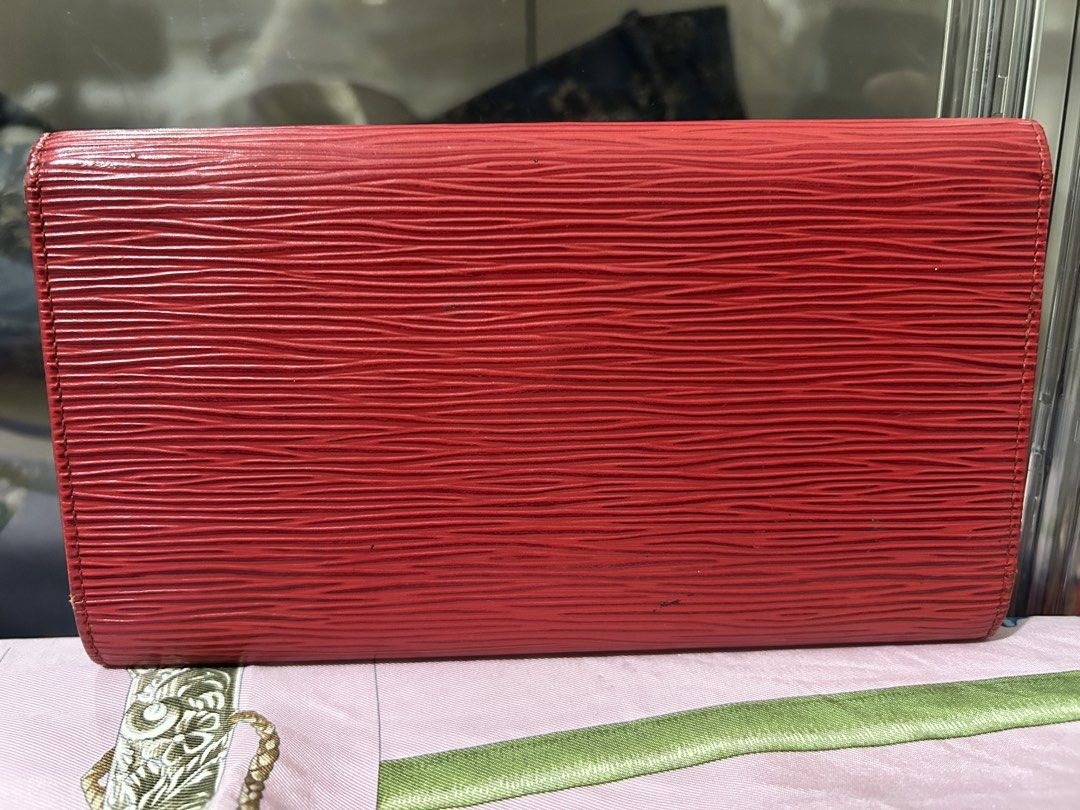 LV French Wallet Epi Leather (Category: Luxury Bags & Wallets) located in Cavite. Submitted by lysagaoinit (Listing ID 1470632342, Image 2). Description: -100% Authentic -red color, Epi leather material -minor flaw on card slot -preloved price 20,000-26,000 Payment Mode: via Gcash/Maya/Bank Transfer Delivery Mode: via J&T (Free delivery) or Lalamove (to be shouldered by buyer) Location: Cavite City .