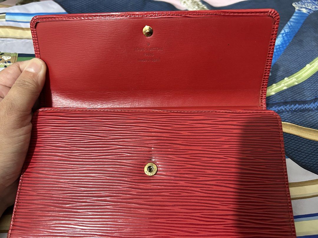 LV French Wallet Epi Leather (Category: Luxury Bags & Wallets) located in Cavite. Submitted by lysagaoinit (Listing ID 1470632342, Image 3). Description: -100% Authentic -red color, Epi leather material -minor flaw on card slot -preloved price 20,000-26,000 Payment Mode: via Gcash/Maya/Bank Transfer Delivery Mode: via J&T (Free delivery) or Lalamove (to be shouldered by buyer) Location: Cavite City .