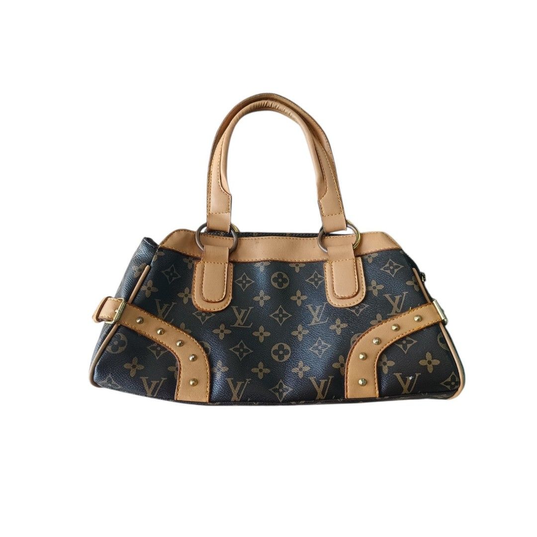 LV monogram hand bag (Category: Luxury Bags & Wallets) located in Naga. Submitted by justthrift09 (Listing ID 1470632891, Image 1). Description: issue: nasa last pic good condition.