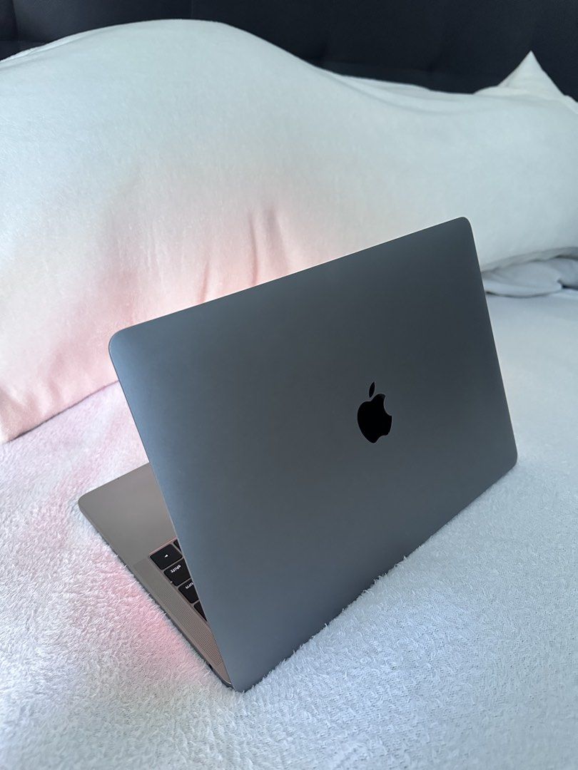 MacBook Pro 13-inch 2017 Space Grey (Category: Laptops & Notebooks) located in Naga. Submitted by marwingarol (Listing ID 1470582285, Image 1). Description: - Model: Apple Laptop in Space Grey with black keyboard - OS: macOS Ventura - Performance: Intel Core i5 processor with 8GB memory - Graphics: Intel Iris Plus Graphics - Ports: Two Thunderbolt 3 ports - Condition: Clean overall appearance, bright screen, and fully operational keyboard and tra