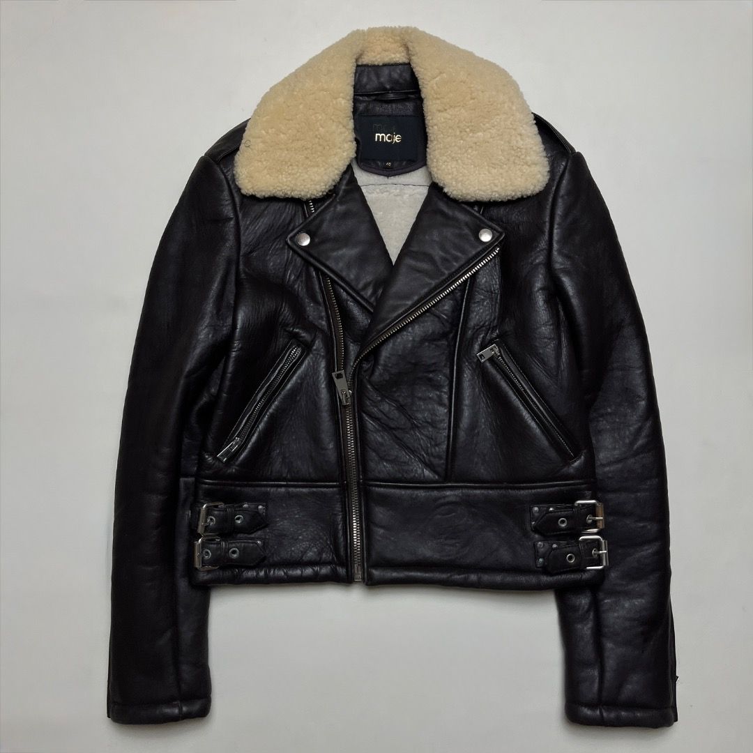 Maje Lambskin Leather Shearling Biker Jacket (Category: Coats, Jackets and Outerwear) located in Caloocan City. Submitted by achilles_grails (Listing ID 1470676055, Image 1). Description: - Brand: Maje - Style: Lambskin Leather Shearling Biker Jacket - Size: 40 - Color: Black with cream shearling - Material: Genuine lambskin leather outer with plush shearling collar and lining - Features: Asymmetric front zipper, zippered pockets, and adjustable 