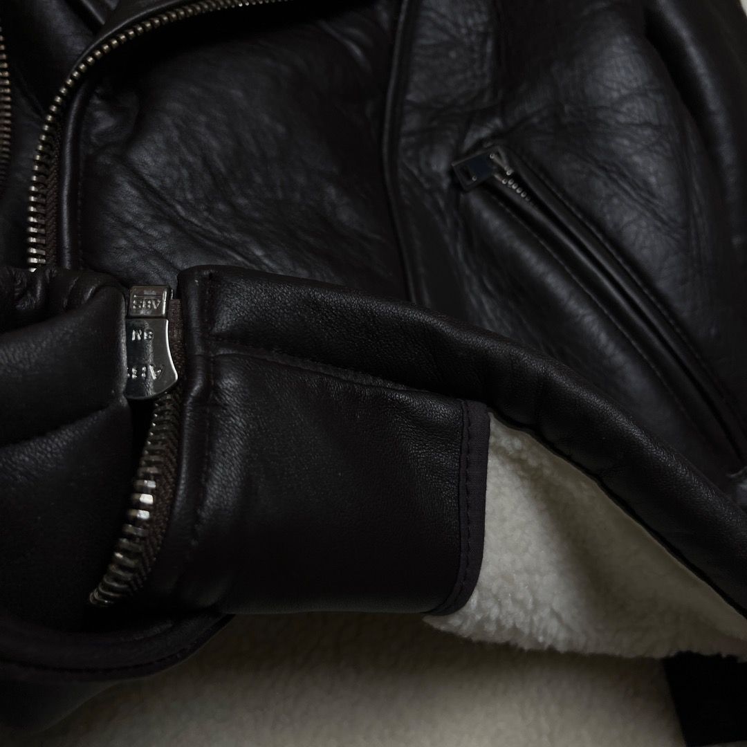 Maje Lambskin Leather Shearling Biker Jacket (Category: Coats, Jackets and Outerwear) located in Caloocan City. Submitted by achilles_grails (Listing ID 1470676055, Image 3). Description: - Brand: Maje - Style: Lambskin Leather Shearling Biker Jacket - Size: 40 - Color: Black with cream shearling - Material: Genuine lambskin leather outer with plush shearling collar and lining - Features: Asymmetric front zipper, zippered pockets, and adjustable 