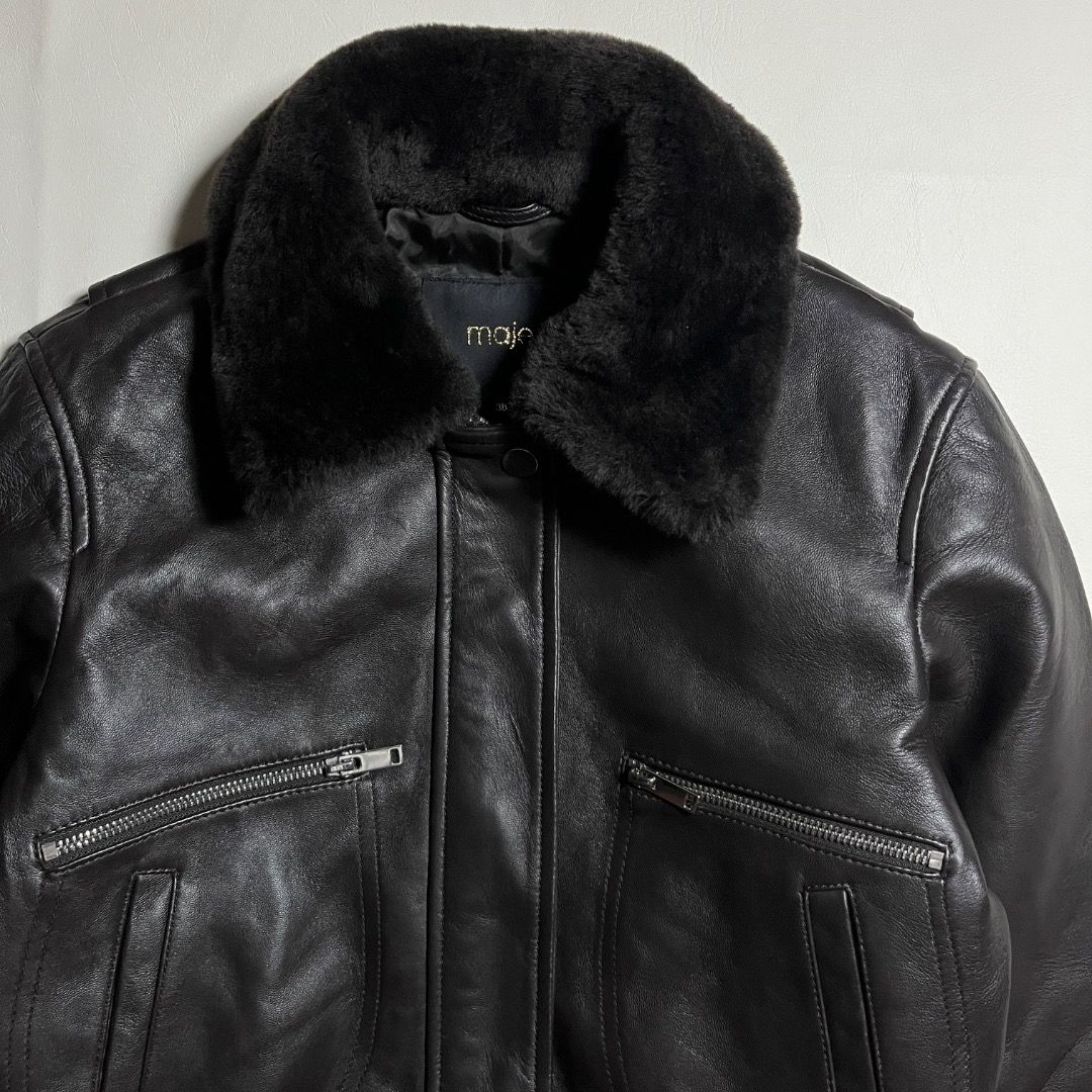 Maje Leather Bomber Jacket Fur Collar Size 38 (Category: Coats, Jackets and Outerwear) located in Caloocan City. Submitted by achilles_grails (Listing ID 1470728119, Image 3). Description: - Brand: Maje - Item: Leather bomber jacket - Color: Dark brown - Size: 38 (Tag size) - Details: Soft fur collar, zipped front pockets, ribbed hem and cuffs, fully lined - Fit & Feel: Heavyweight, warm, and great for cold weather.