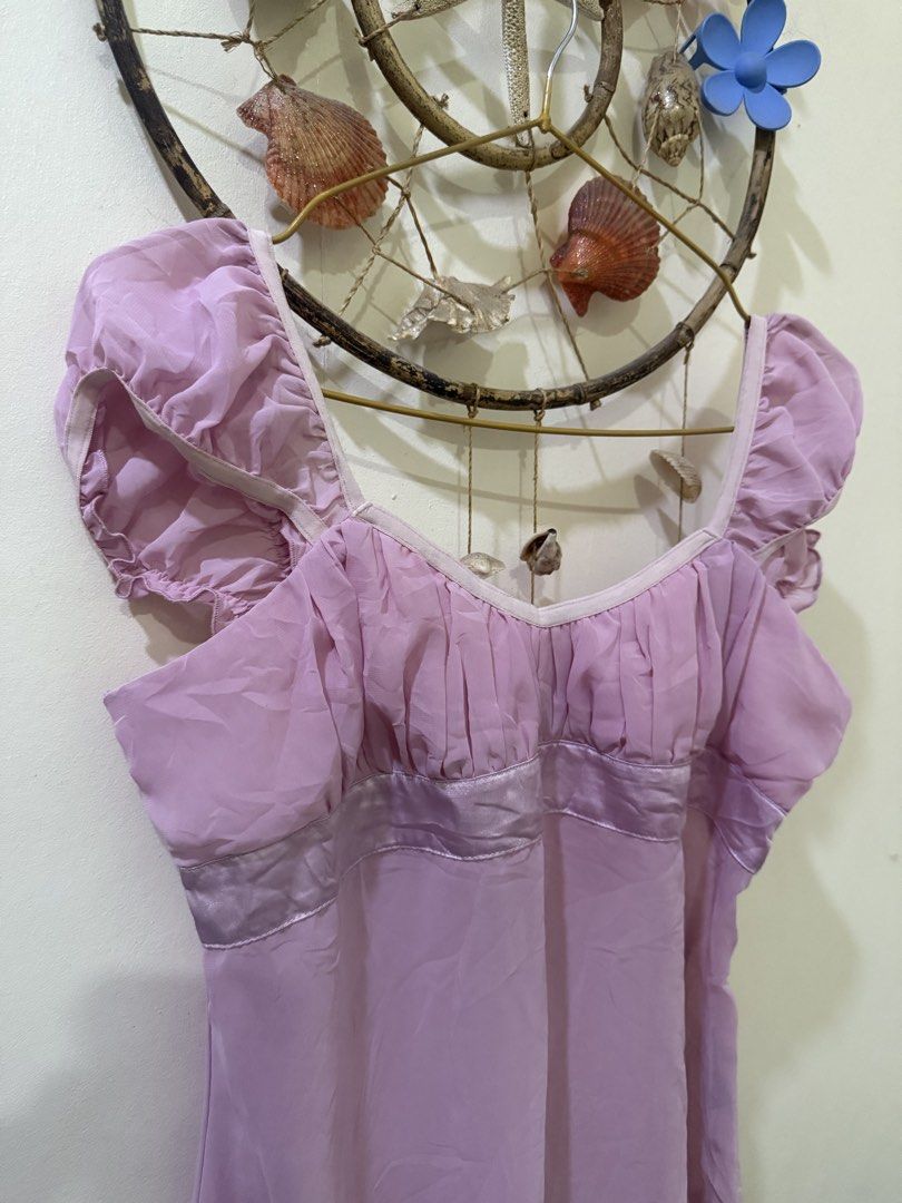 Majora Lavender Chiffon Ruffle Cap Sleeve Blouse Top M (Category: Blouses) located in Cebu City. Submitted by hotchkisscebu (Listing ID 1470636113, Image 3). Description: - Brand/Model: Majora Lavender Blouse - Size: Medium (M) - Material: Lightweight chiffon - Design: Square neckline (front and back), gathered bust, and satin waist band - Details: Cute ruffle cap sleeves and pretty floral lace trim along the bottom hem - Origin: Made in China.