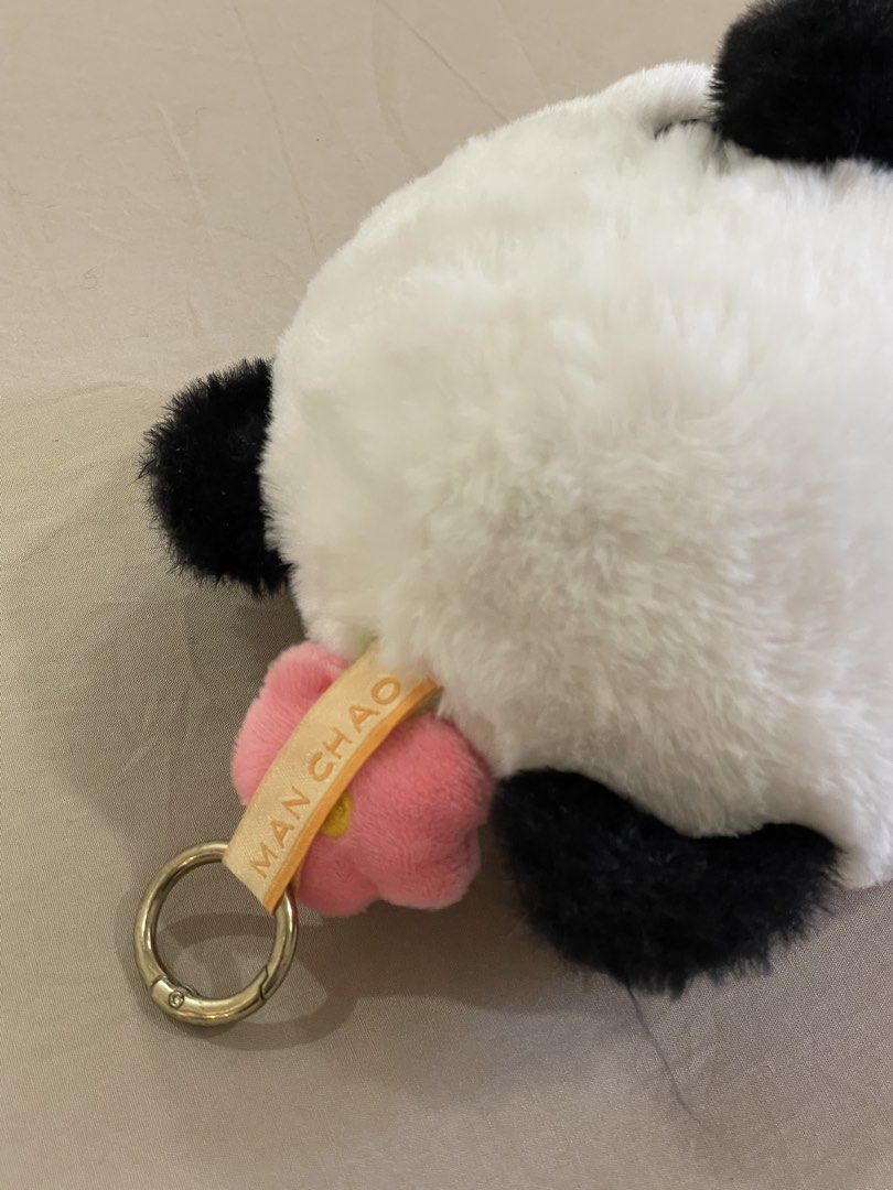Man Chao Panda Plush Face Keychain Bag Charm (Authentic) (Category: Plushies & Soft Toys) located in San Juan City. Submitted by declutterdiariesmnl (Listing ID 1470640833, Image 3). Description: Manchao V2 Chubby Animal Plush Pendant (Panda character version), part of the Manchao plush head blind box series. Key Details • Character: Panda (with a green-haired doll face and pink flower sprout on top) • Type: Round plush head bag charm / pendant •