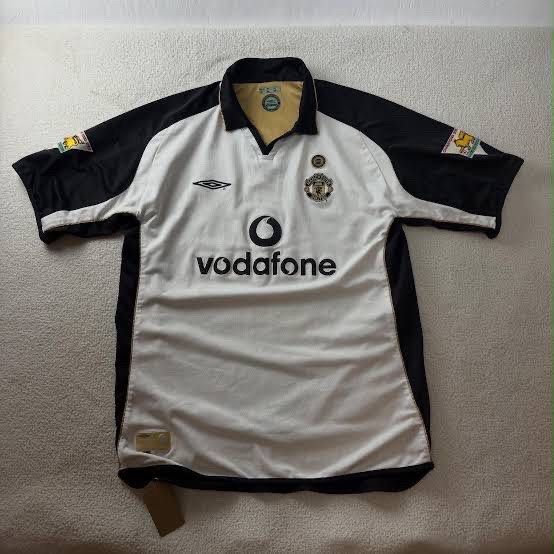 Manchester United Beckham 7 Jersey (100th anniversary) (Category: Activewear) located in Manila. Submitted by ianxr (Listing ID 1470677521, Image 1). Description: - Authentic Manchester United away jersey - Vodafone era vintage classic - David Beckham #7 printing on the back - Iconic Umbro design with stylish black and white panels - Features embroidered club crest and sponsor logos - Short sleeves with a classic polo collar - Perfect for fans an