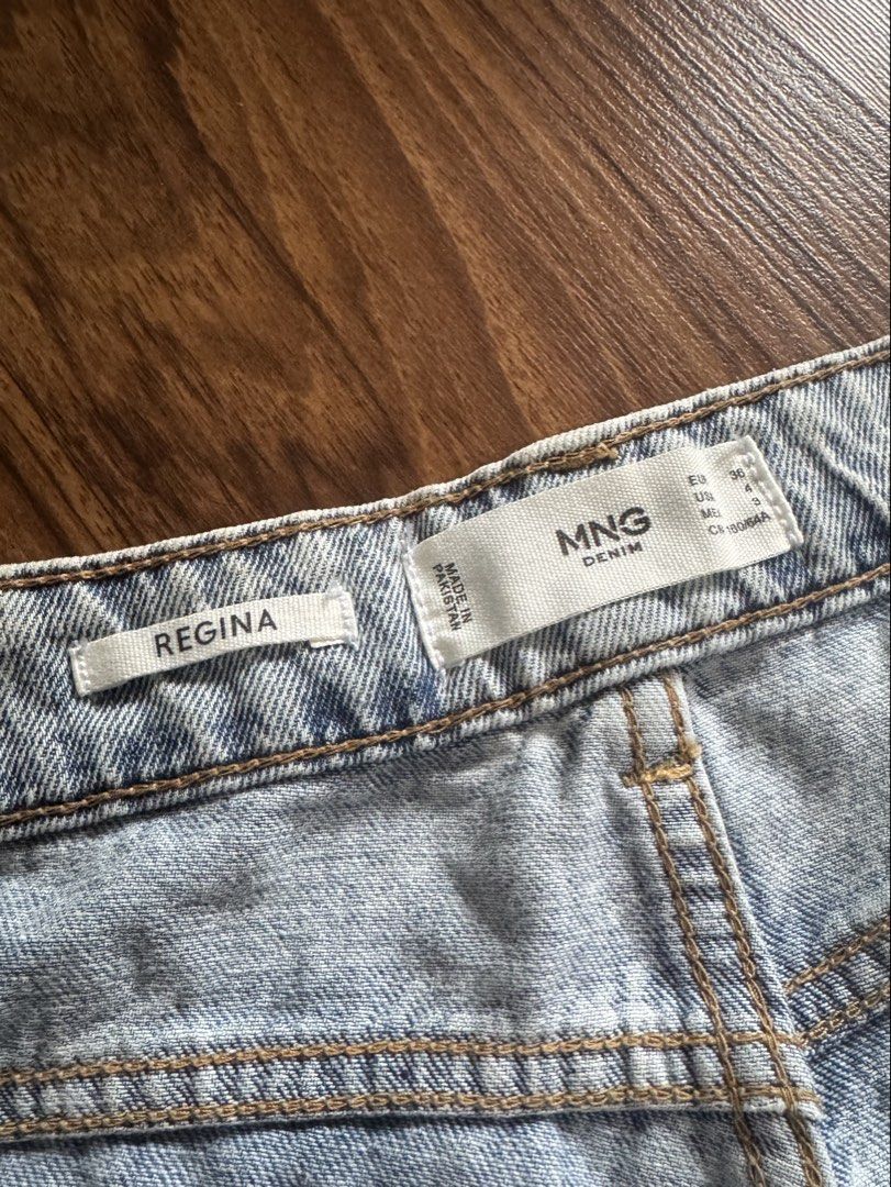 Mango Light Wash Pleated Denim Pants (Category: Jeans) located in Pasig City. Submitted by kia.sell (Listing ID 1470655033, Image 3). Description: - Brand: Mango / MNG - Style: High-waisted pleated mom jeans / relaxed tapered fit - Color: Light Blue Acid Wash - Design Details: Flattering high-rise waist with tailored front darts/pleats, classic 4-pocket, and a relaxed silhouette that tapers slightly at the ankles. - Condition: Excellent pre-loved