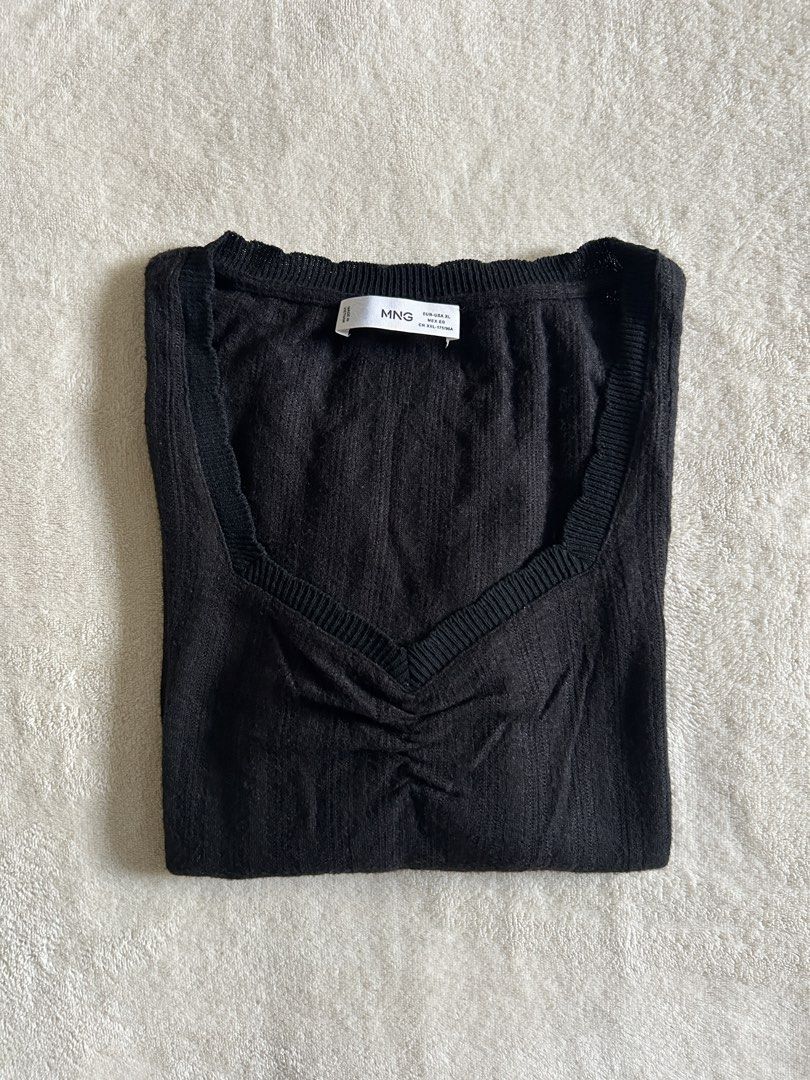 Mango MNG V-Neck Ribbed Longsleeve (Category: Longsleeves) located in Carigara. Submitted by abiesclutter (Listing ID 1470621449, Image 1). Description: Brand: Mango MNG Size: XL Design: Lightweight, vertical-ribbed textured knit fabric, V-neckline and a ribbed elasticated trim running along the collar Made in: Vietnam Condition: Signs of usage, discoloration and a tiny dot bleach stain (see photos).