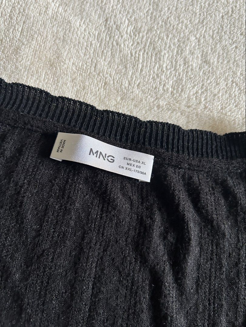 Mango MNG V-Neck Ribbed Longsleeve (Category: Longsleeves) located in Carigara. Submitted by abiesclutter (Listing ID 1470621449, Image 3). Description: Brand: Mango MNG Size: XL Design: Lightweight, vertical-ribbed textured knit fabric, V-neckline and a ribbed elasticated trim running along the collar Made in: Vietnam Condition: Signs of usage, discoloration and a tiny dot bleach stain (see photos).