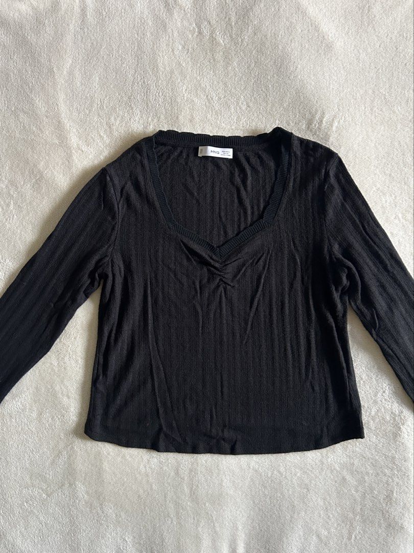 Mango MNG V-Neck Ribbed Longsleeve (Category: Longsleeves) located in Carigara. Submitted by abiesclutter (Listing ID 1470621449, Image 2). Description: Brand: Mango MNG Size: XL Design: Lightweight, vertical-ribbed textured knit fabric, V-neckline and a ribbed elasticated trim running along the collar Made in: Vietnam Condition: Signs of usage, discoloration and a tiny dot bleach stain (see photos).