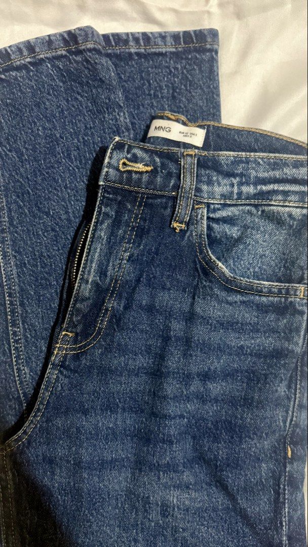 Mango Newmom Dark Denim Jeans (Category: Jeans) located in Caloocan City. Submitted by dyosalyn (Listing ID 1470674123, Image 2). Description: - Brand: Mango - Style: Newmom jeans - Color: Dark blue wash - Stretchy - Rise: High waist - Size: EUR 32 (fit up to 26).