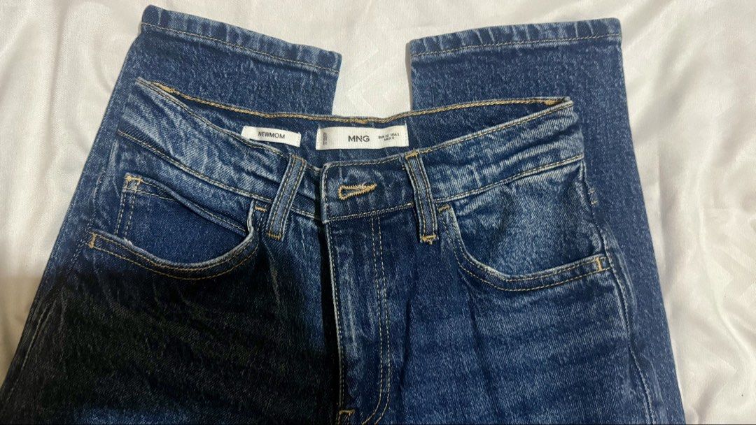 Mango Newmom Dark Denim Jeans (Category: Jeans) located in Caloocan City. Submitted by dyosalyn (Listing ID 1470674123, Image 1). Description: - Brand: Mango - Style: Newmom jeans - Color: Dark blue wash - Stretchy - Rise: High waist - Size: EUR 32 (fit up to 26).