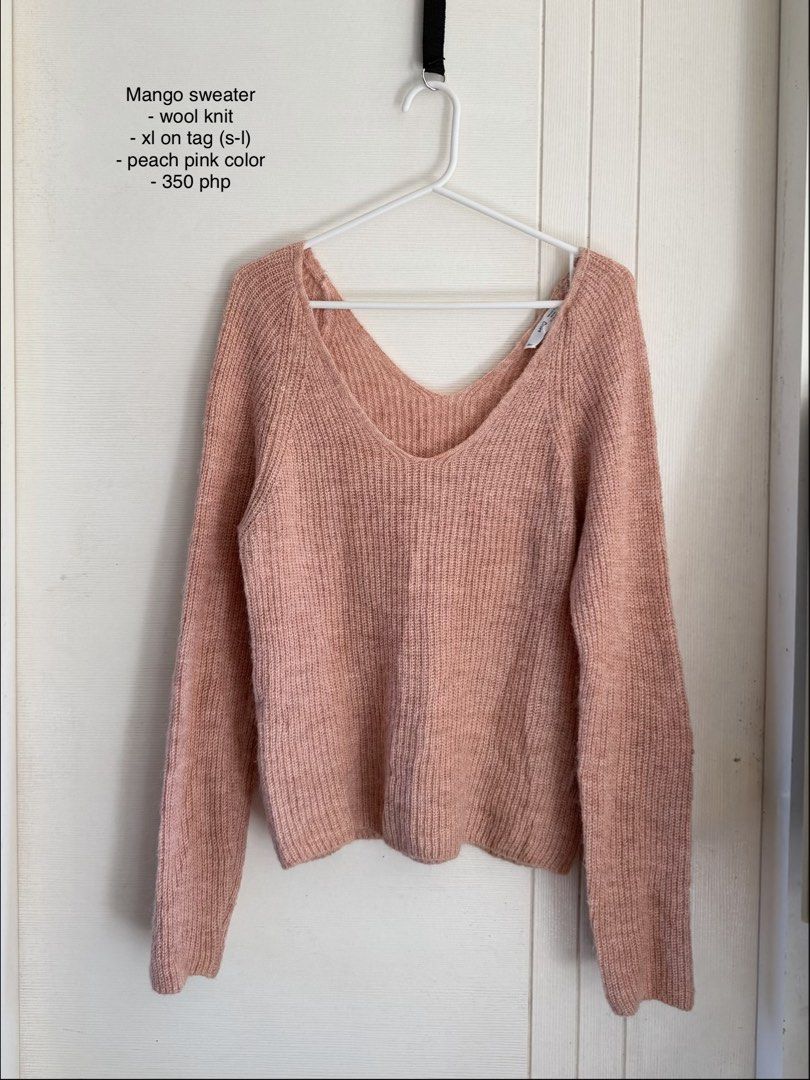 Mango Peach Pink Wool Knit Sweater (Category: Coats, Jackets and Outerwear) located in Manila. Submitted by cinnmoroll (Listing ID 1470597308, Image 1). Description: - Brand: Mango - Style: Wool knit sweater with wide V-neckline - Color: Lovely peach pink - Size: Tagged XL (fits standard oversized or regular) - Material: Cozy textured knit - Origin: Made in Turkey - Condition: Clean, well-maintained staple piece for cooler weather.