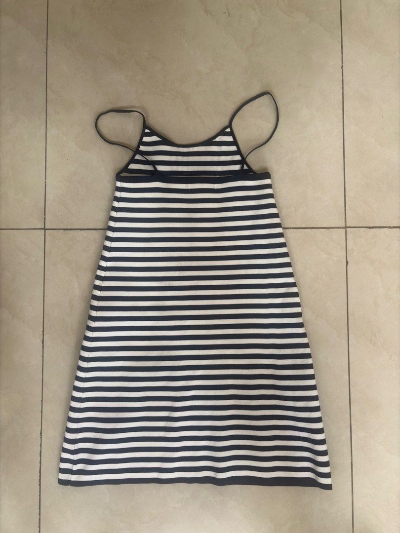 Mango Striped Ribbed Dress (Category: Dresses) located in Manila. Submitted by chrsinyourarea (Listing ID 1470639060, Image 2). Description: Brand: Mango Style: Ribbed dress with navy blue and white horizontal stripes Design: Spaghetti straps, scoop neckline (front and back) Fit: Stretchy, super comfortable fabric Size: EUR-USA S Condition: Used once. Kept in storage..