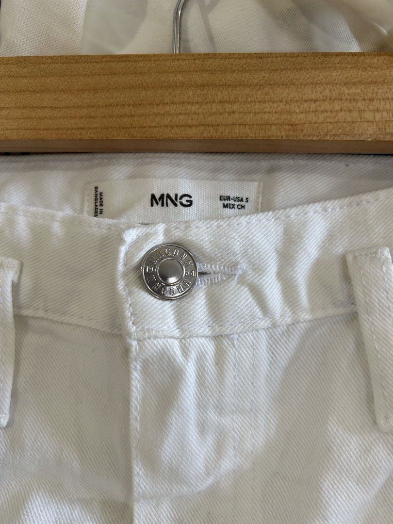 Mango White Denim Midi Skirt Size S (Category: Skirts) located in Manila. Submitted by isabelle_1104 (Listing ID 1470672653, Image 3). Description: Used only twice. But with a little blue ink pen at the back. Please see pic .