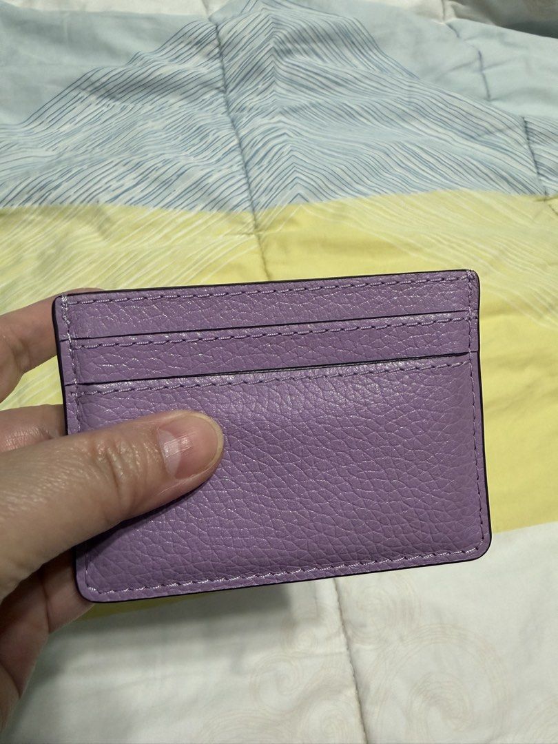 Marc Jacobs Purple Leather Card Holder (Category: Luxury Bags & Wallets) located in Quezon City. Submitted by ja_preloved4u (Listing ID 1470680568, Image 2). Description: ■Product Number: S102L01FA21 ■Color: Rugged Lavender ■Material: Leather ■Size: Approx. Height 2.9 x Width 3.9 inches (7.3 x 10 cm) ■Details: Card pockets x 4 open pockets.
