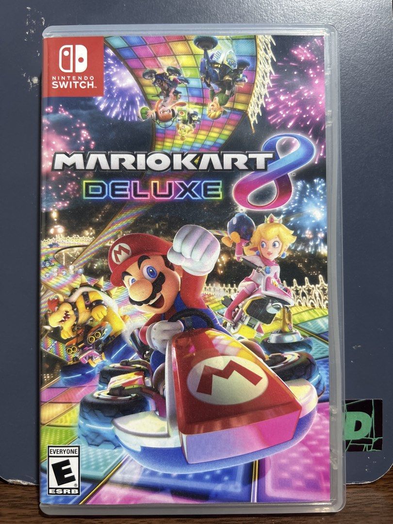 Mario Kart 8 Deluxe Nintendo Switch Game (Category: Nintendo) located in Bacoor. Submitted by kidlat_bilis (Listing ID 1470698494, Image 1). Description: Mario Kart 8 Deluxe for Nintendo Switch. Physical cartridge inside the original case with cover art and insert. ESRB rating E for Everyone. Tested and working great. Great multiplayer racing game for family and friends. Local play up to 8 players, online up to 12. Cartridge snaps securely into t